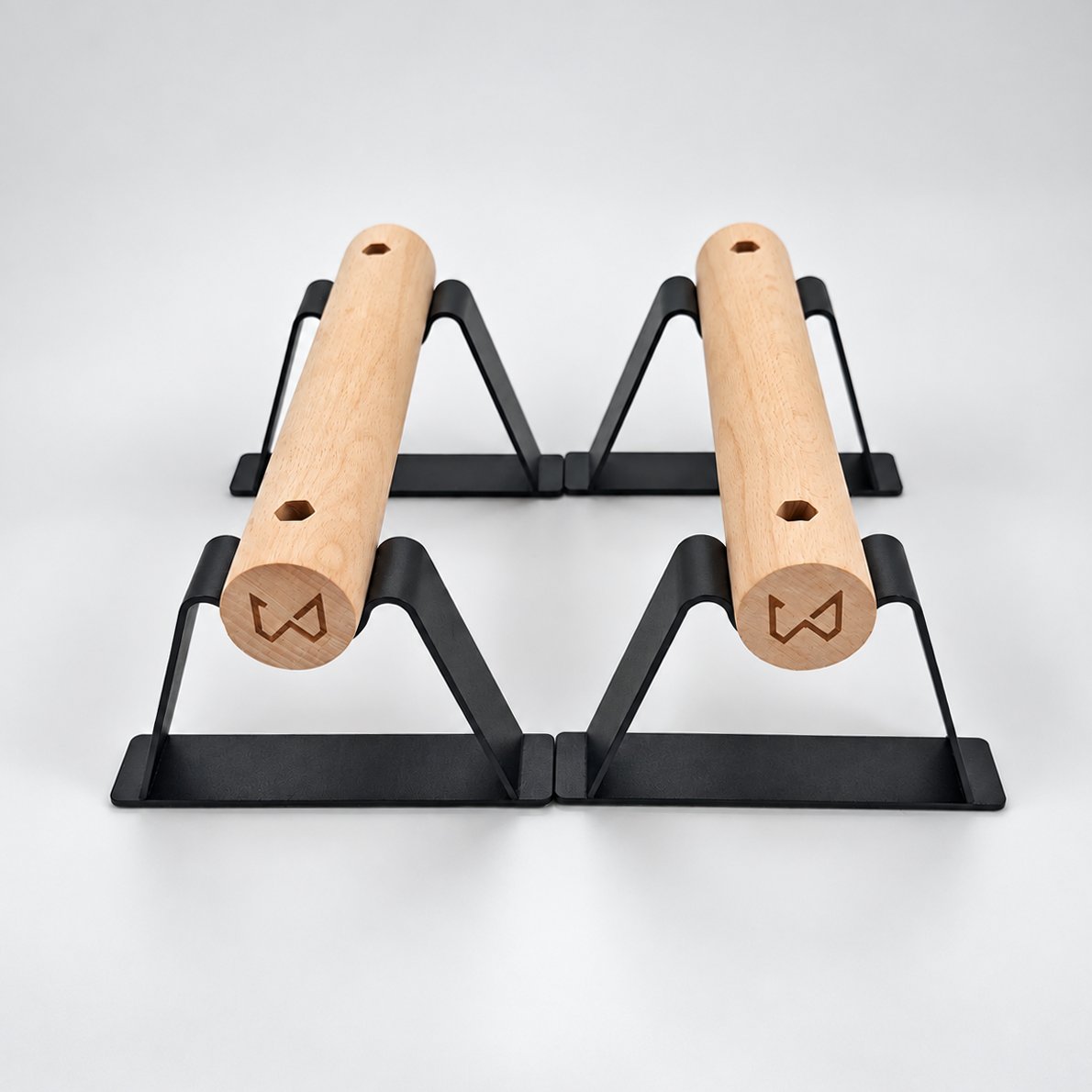 Par de parallettes Antlettes de Xtenia sobre un fondo neutro
